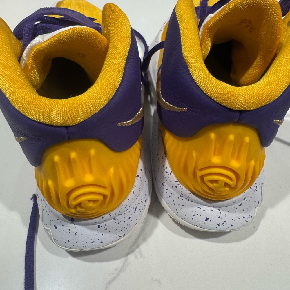 Nike Yellow and Purple Sneakers with Distinctive Design